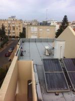 איטום גג בניין משותף באמצעות החלמת יריעות ביטומניות שביצע אמיר מחברת "האחים תמם"